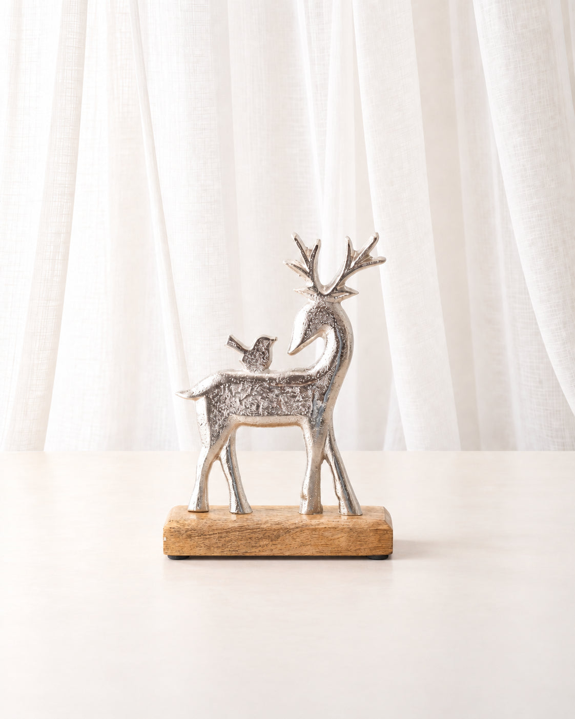 Silver Reindeer with Bird Ornament
